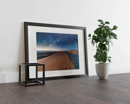 Desert Horizon - A vast desert with sand dunes under a clear night sky filled with stars